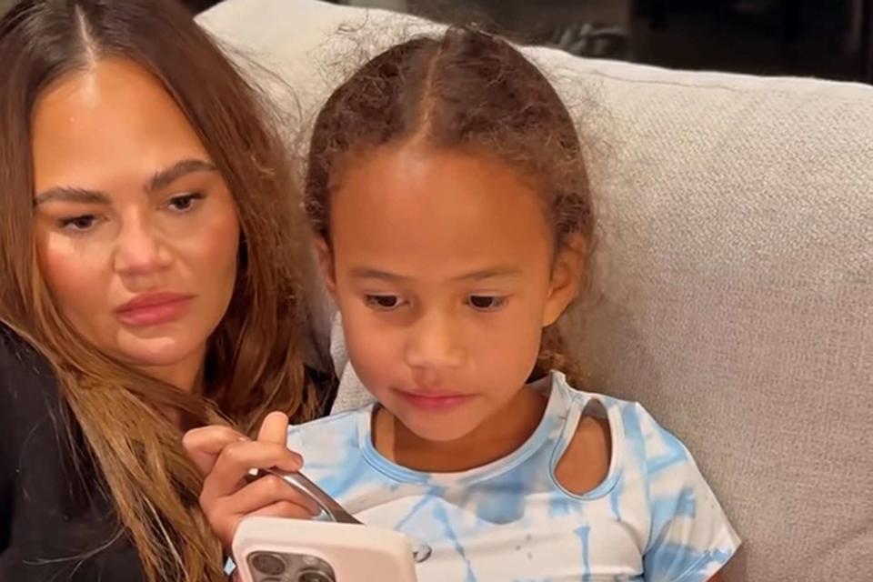 <p>Chrissy Teigen/Instagram</p> Chrissy Teigen and daughter Luna watch jump scare videos together