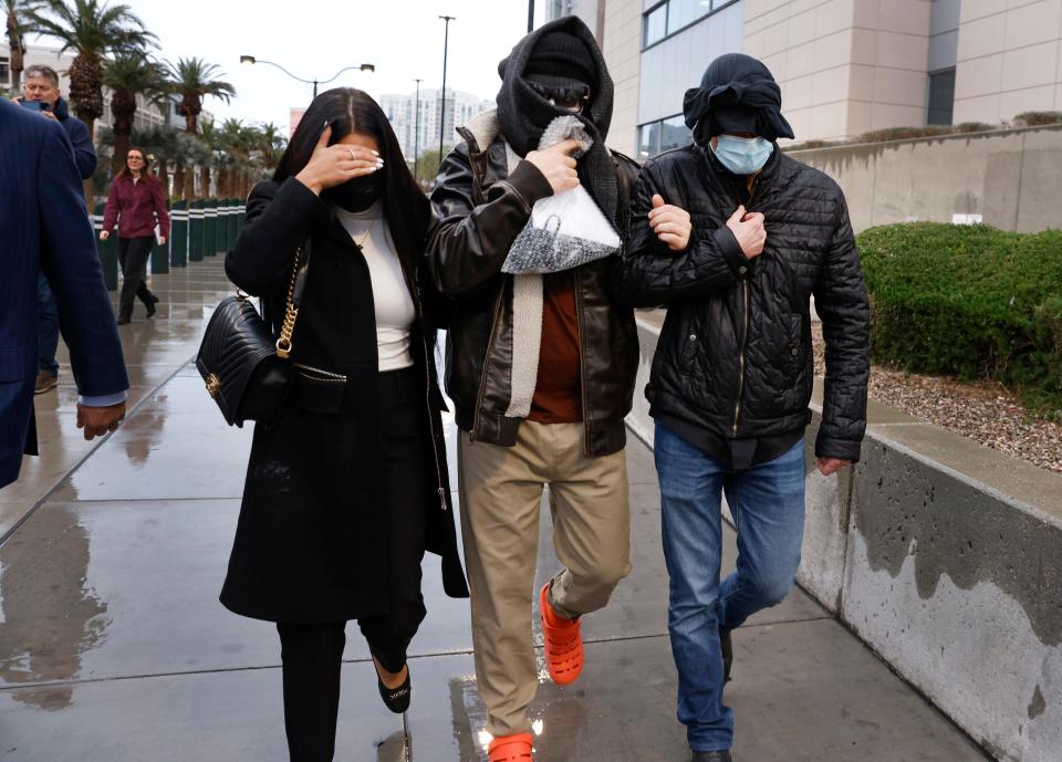 Former FBI informant Alexander Smirnov, center, leaves the courthouse on Feb. 20, 2024, in Las Vegas. Prosecutors say that Smirnov, who is charged with making up a multimillion-dollar bribery scheme involving President Joe Biden, his son Hunter and a Ukrainian energy company, had contacts with Russian intelligence-affiliated officials.