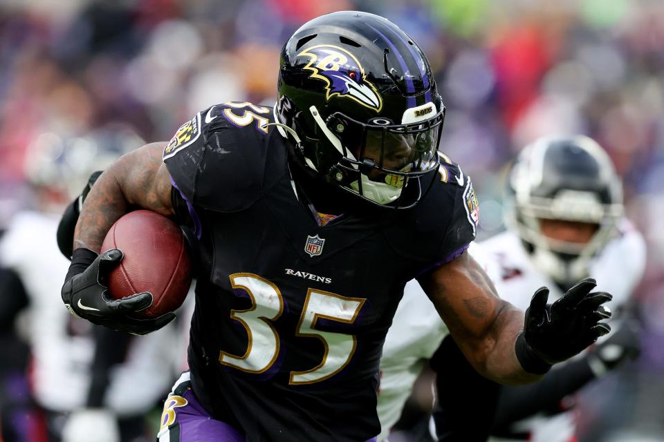 BALTIMORE, MARYLAND - DECEMBER 24: Gus Edwards #35 of the Baltimore Ravens \ at M&T Bank Stadium on December 24, 2022 in Baltimore, Maryland. (Photo by Todd Olszewski/Getty Images)