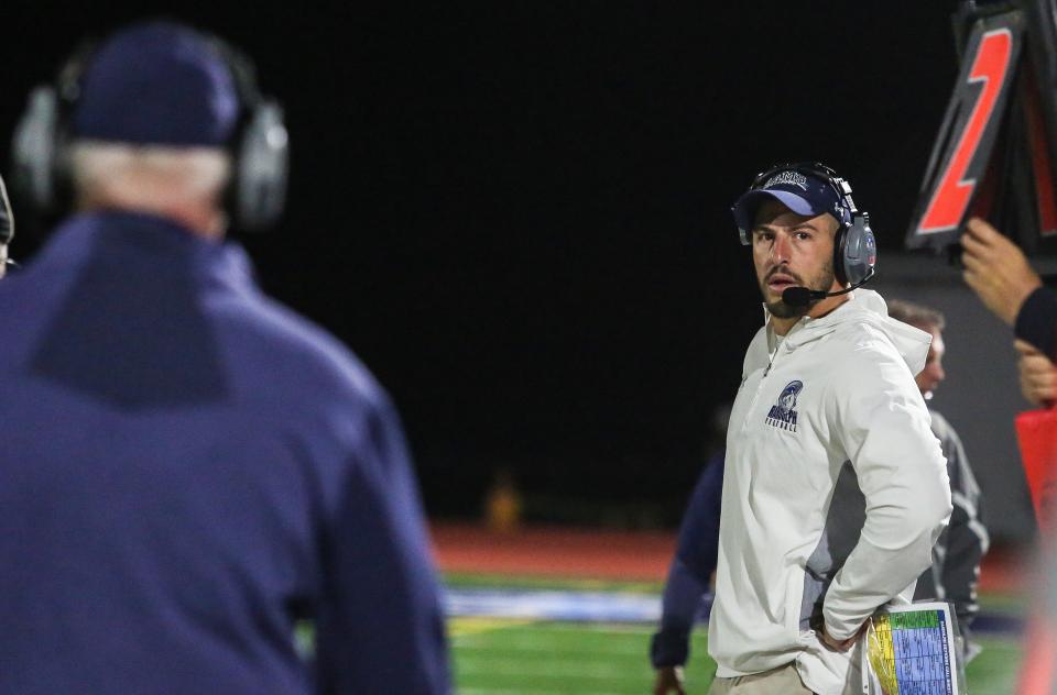 Randolph coach Will Nahan on the sideline during the first half of a football game at West Morris Central High School on October 01, 2021.  Alexandra Pais/ For The Daily Record