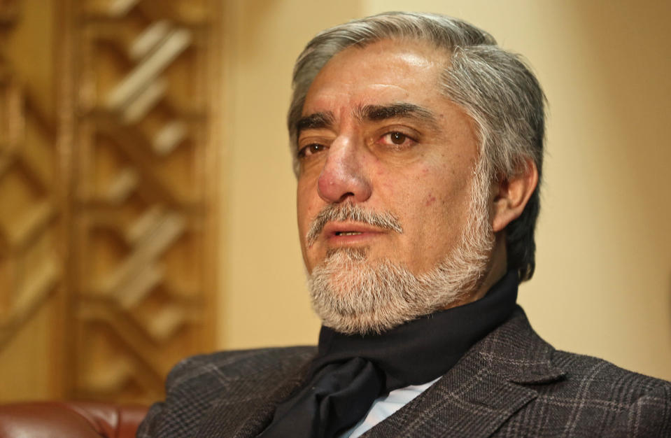 Afghan presidential candidate Abdullah Abdullah talks during an interview with Associated Press at his residence in Kabul, Afghanistan, Thursday, March 13, 2014. One of the main front-runners in the race to succeed Afghan leader Hamid Karzai tells The Associated Press that he will sign a security agreement with the United States within a month if he wins the race. Abdullah Abdullah criticized Karzai for refusing sign the deal, which would pave the way for international forces to keep a residual force in Afghanistan after withdrawing combat troops by the end of 2014. (AP Photo/Massoud Hossaini)