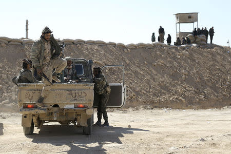 Syrian Democratic Forces (SDF) gather in northern Deir al-Zor province ahead of an offensive against Islamic State militants, Syria February 21, 2017. REUTERS/Rodi Said