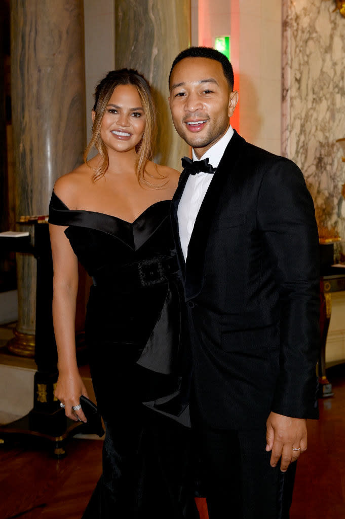 Chrissy Teigen and John Legend at a formal event