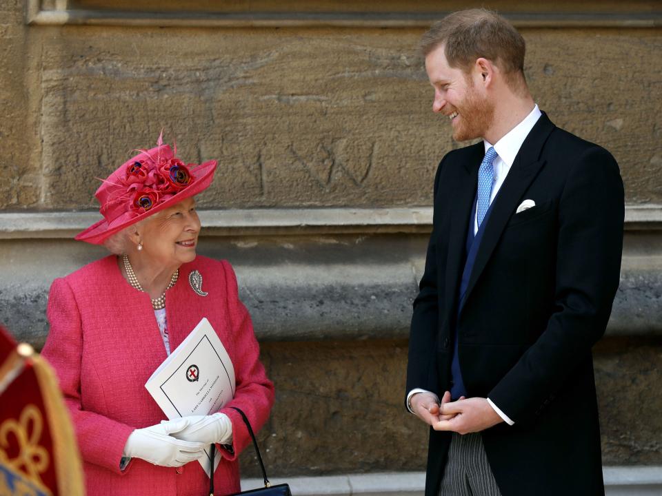 Queen Elizabeth II speaks with Prince Harry, Duke of Sussex as they leave after the wedding of Lady Gabriella Windsor to Thomas Kingston at St George's Chapel, Windsor Castle on May 18, 2019 in Windsor, England.