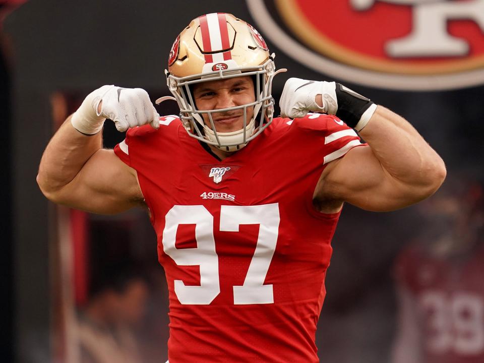 Nick Bosa #97 of the San Francisco 49ers runs onto the field prior to the start of the NFC Championship game against the Green Bay Packers at Levi's Stadium on January 19, 2020 in Santa Clara, California