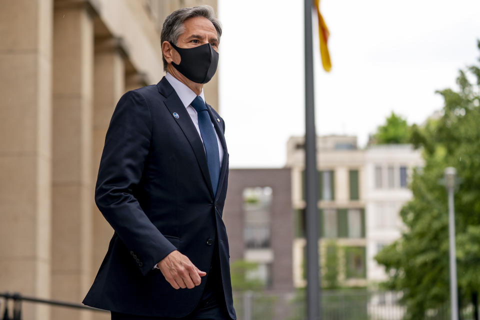 Secretary of State Antony Blinken walks towards members of the media to give a statement at the start of the Second Berlin Conference on Libya at the Ministry of Foreign Affairs in Berlin, Wednesday, June 23, 2021. Blinken begins a week long trip in Europe traveling to Germany, France and Italy. (AP Photo/Andrew Harnik, Pool)