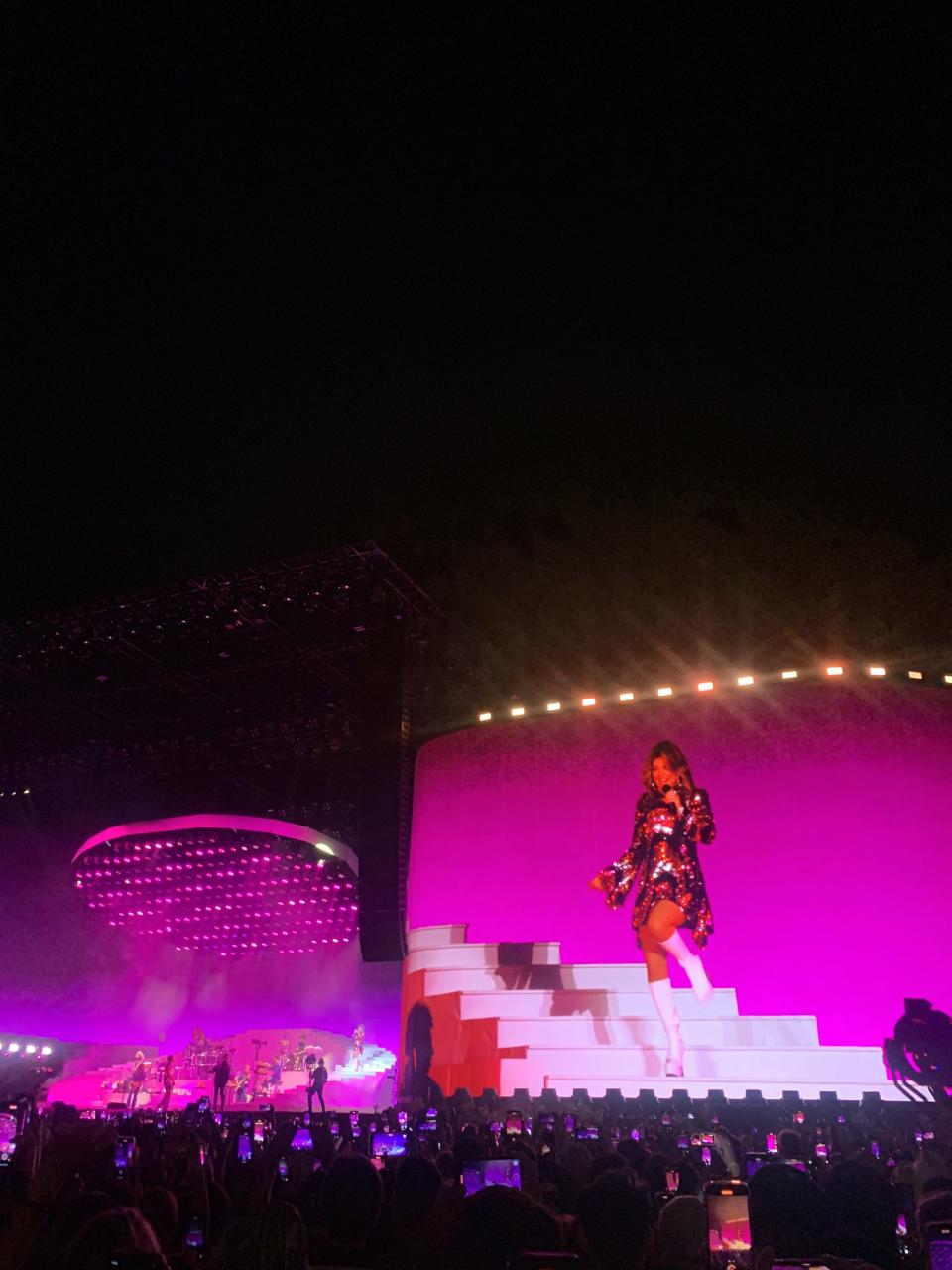 Shania Twain performing on stage during Harry Styles' Coachella set