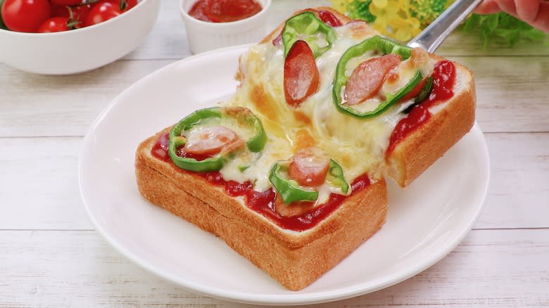 pizza toast on white plate