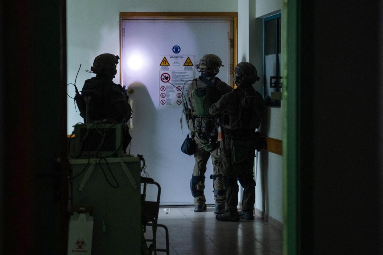 This handout picture released by the Israeli army on Nov. 15, 2023, reportedly shows Israeli soldiers carrying out operations inside Al-Shifa hospital in Gaza.