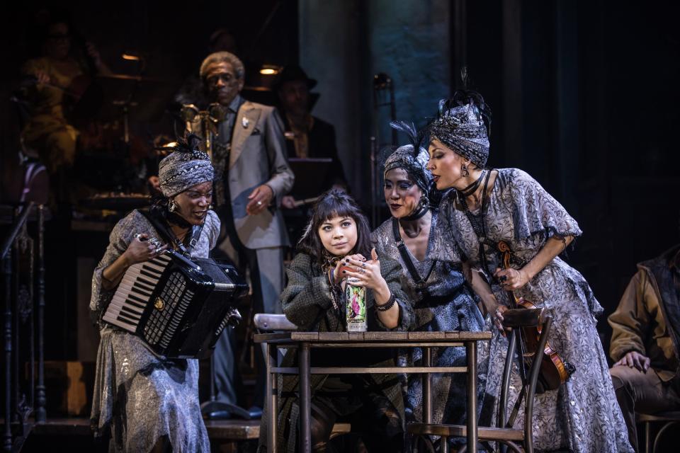 Eva Noblezada (center) performs as Eurydice in the Broadway production of "Hadestown" by Anais Mitchell.