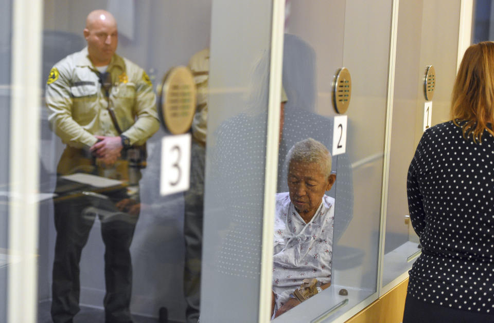 FILE - In this July 9, 2018 file photo, Thomas Kim sits in a hospital gown in a wheelchair as his arraignment is postponed in Superior Court in Long Beach, Calif. Kim, 77, charged with shooting to death a fire captain at a Southern California senior housing facility has died Sunday, Aug. 5, 2018, in custody from an existing medical condition, authorities said Monday, Aug. 6. Kim was charged with murder for the death of Capt. David Rosa on June 25 at Covenant Manor, an 11-story senior apartment complex. (Scott Varley/The Orange County Register via AP, Pool, File)