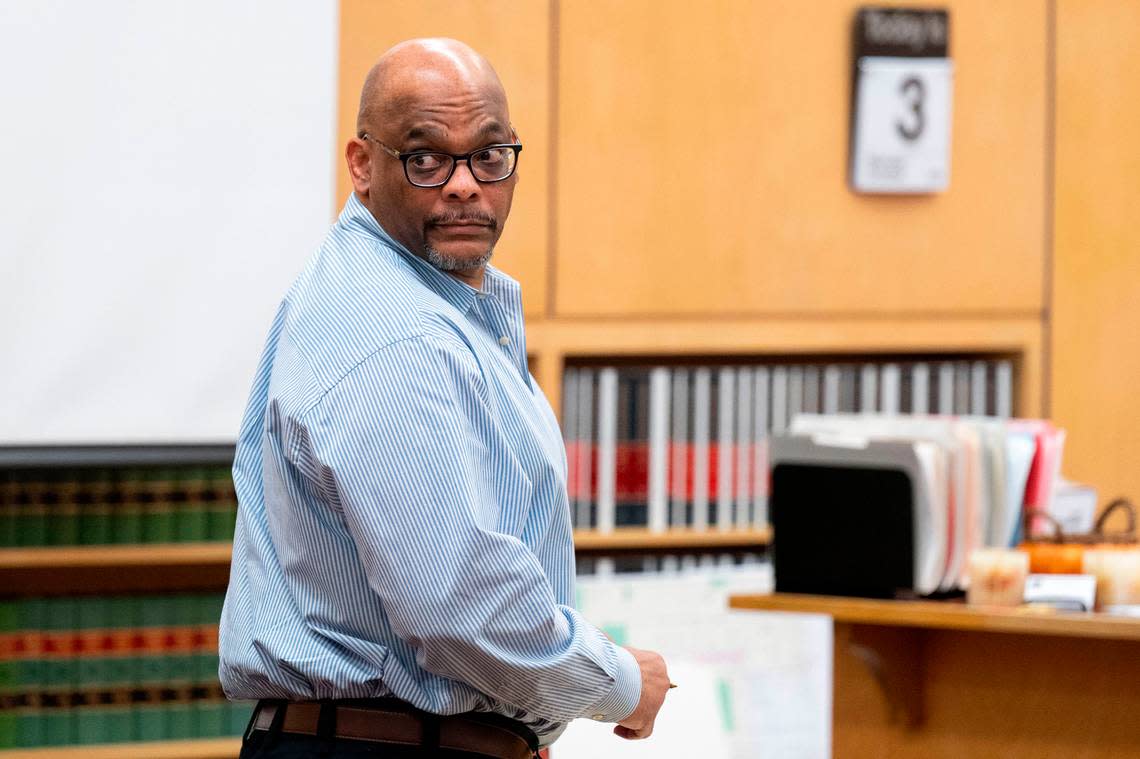 Dorcus Dewayne Allen, 51, stands in the courtroom during a recess after Pierce County deputy prosecutor Sunni Ko made her opening statement in front of Judge Edmond Murphy in Pierce County Superior Court on Monday, Oct. 3, 2022, in Tacoma.