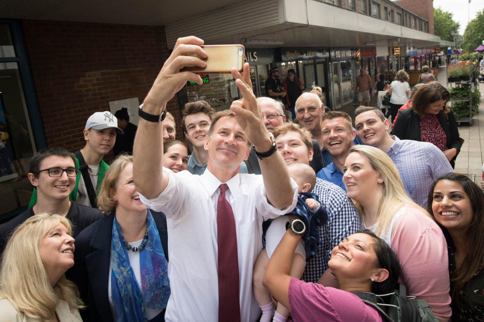 Jeremy Hunt takes a selfie with supporters. Photo: Press Association