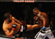 ATLANTA, GA - APRIL 21: John Makdessi (L) kicks Anthony Njokuani during their lightweight bout for UFC 145 at Philips Arena on April 21, 2012 in Atlanta, Georgia.