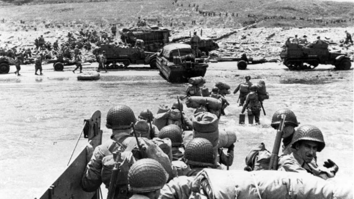  American troops land at Omaha Beach in Normandy. 