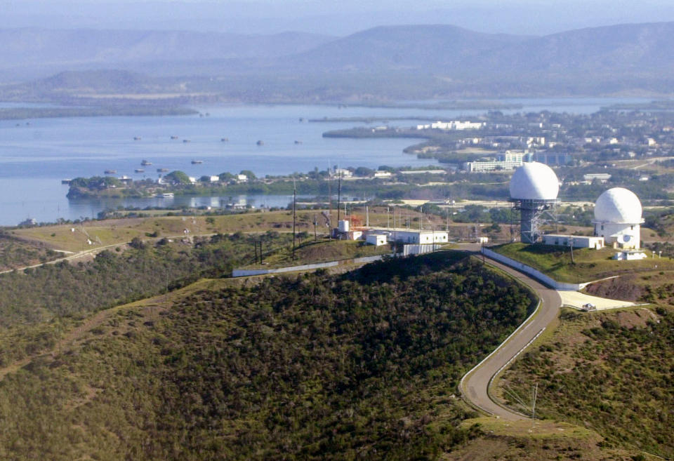 FILE - This Jan. 19, 2002, file photo shows an aerial view of the U.S. Naval Base in Guantanamo Bay, Cuba. The 20th anniversary of the first prisoners' arrival at the Guantanamo Bay detention center is on Tuesday, Jan. 11, 2022. There are now 39 prisoners left. At its peak, in 2003, the detention center held nearly 680 prisoners. (AP Photo/Lynne Sladky, File)