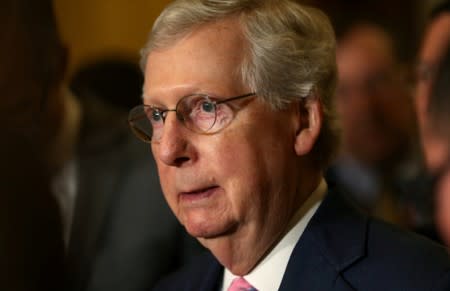 FILE PHOTO: U.S. Senate Majority Leader Mitch McConnell speaks to the news media in the U.S. Capitol Building in Washington