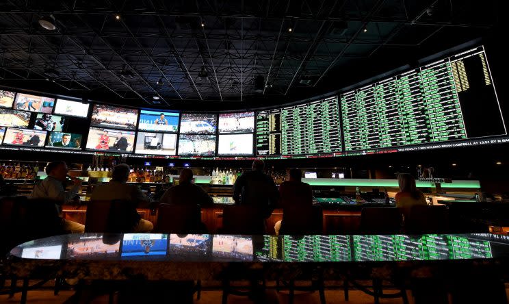 The betting line and some of the nearly 400 proposition bets for Super Bowl 50 between the Carolina Panthers and the Denver Broncos are displayed at the Race & Sports SuperBook at the Westgate Las Vegas Resort & Casino on February 2, 2016 in Las Vegas, Nevada. The newly renovated sports book has the world's largest indoor LED video wall with 4,488 square feet of HD video screens measuring 240 feet wide and 20 feet tall. (Photo by Ethan Miller/Getty Images)