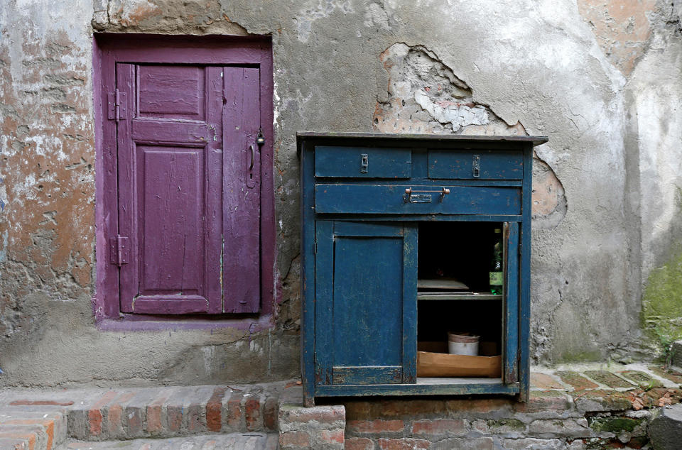 <p>A small door and a piece of furniture are seen on a street in the old town, Tbilisi, Georgia, April 6, 2017. (Photo: David Mdzinarishvili/Reuters) </p>