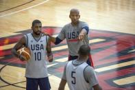 Jul 19, 2016; Las Vegas, NV, USA; USA assistant coach Monty Williams talks to guard Kyrie Irving (10) and guard Kevin Durant (5) during a practice at Mendenhall Center. Mandatory Credit: Joshua Dahl-USA TODAY Sports