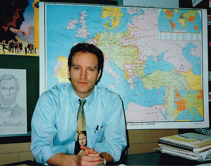 Rodney Wilson poses for a portrait in his classroom at the Mehlville R-IX School District in St. Louis in the 1990s. Wilson was a high school social studies teacher at the district from 1990-1997. He came out to one of his classes as gay in 1994.