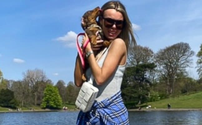 Ashley Dale with her dog Darla in Sefton Park, Liverpool