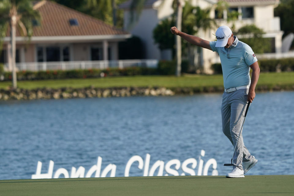 Matt Jones celebrates after he wins the Honda Classic on March 21, 2021.