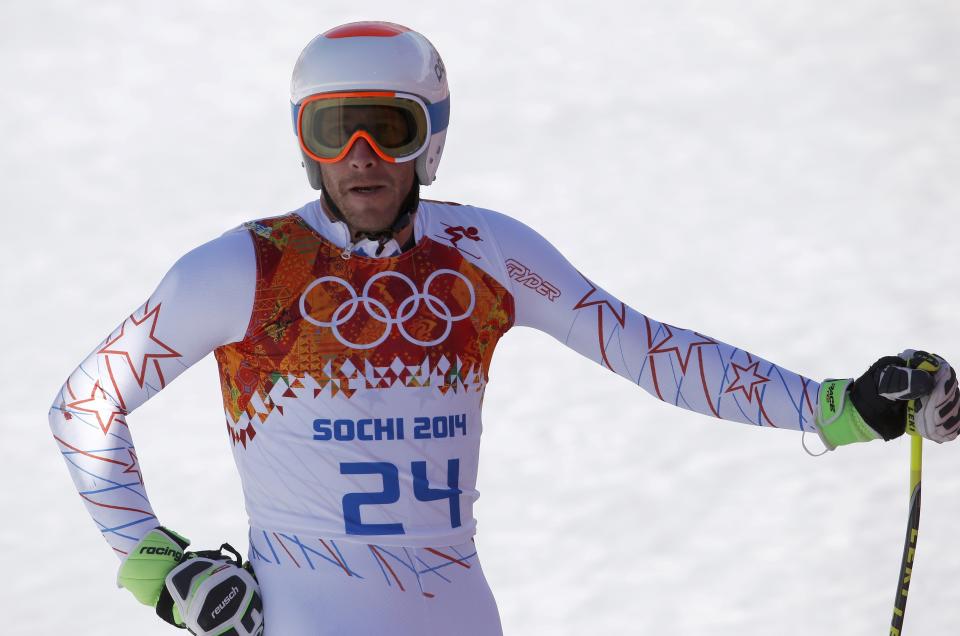 Bode Miller of the U.S. reacts in the finish area after competing in the downhill run of the men's alpine skiing super combined event during the 2014 Sochi Winter Olympics at the Rosa Khutor Alpine Center in Rosa Khutor February 14, 2014. REUTERS/Leonhard Foeger