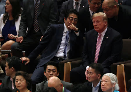 U.S. President Donald Trump and Japanese Prime Minister Shinzo Abe watch the Summer Grand Sumo Tournament at Ryogoku Kokigikan Sumo Hall in Tokyo, Japan May 26, 2019. REUTERS/Jonathan Ernst