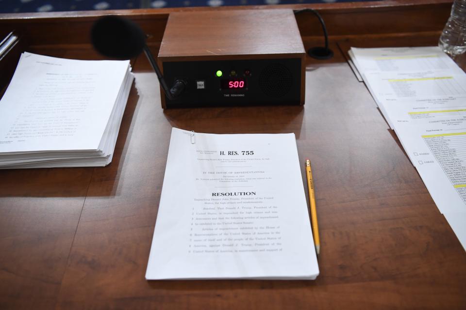 A printed copy of H.Res. 755, Articles of Impeachment Against President Donald J. Trump is seen on a table as the House Judiciary Committee continues debate to markup the Articles of Impeachment Against President Donald J. Trump in Washington, DC on Dec. 12, 2019.