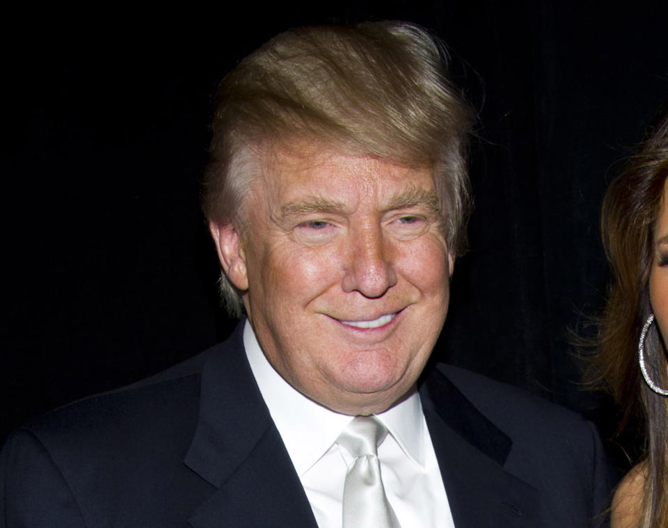 FILE - In this Nov. 14, 2011 file photo, Donald Trump attends the Friars Club's Testimonial Dinner honoring Larry King, in New York. Trump has launched a new men's fragrance called "Success." (AP Photo/Charles Sykes, file)