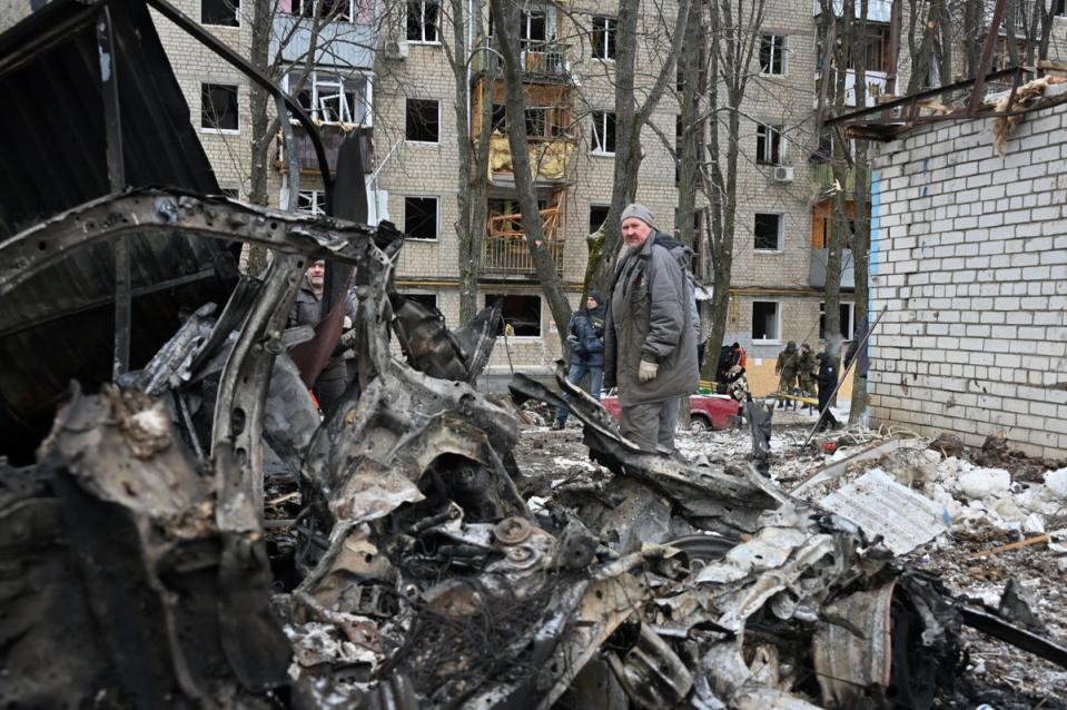 A residential building damaged from a missile attack in Kharkiv on Tuesday (AFP via Getty Images)