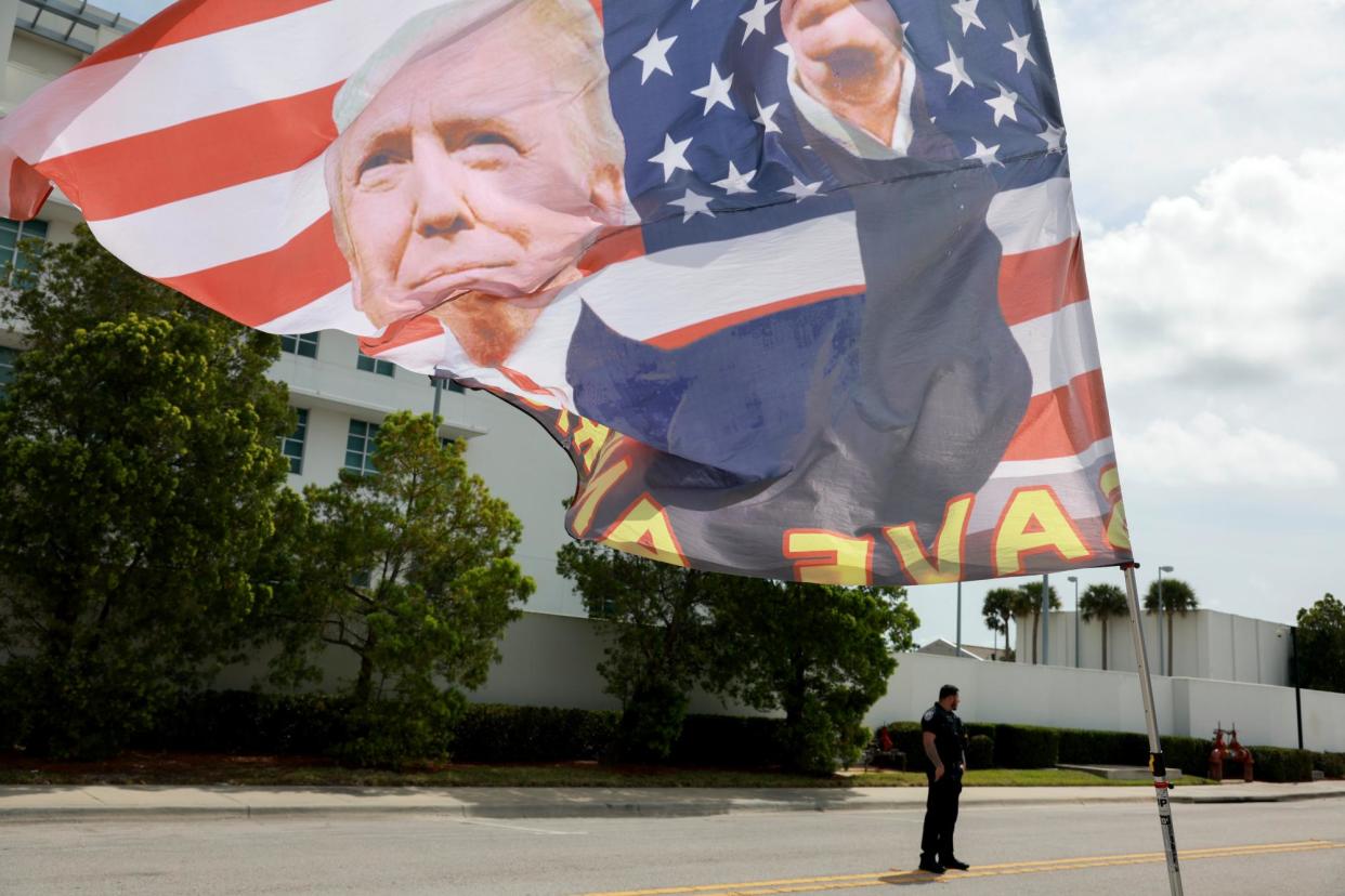 <span>A flag showing support for Donald Trump flies outside a courthouse on 1 March in Fort Pierce, Florida. </span><span>Photograph: Joe Raedle/Getty Images</span>