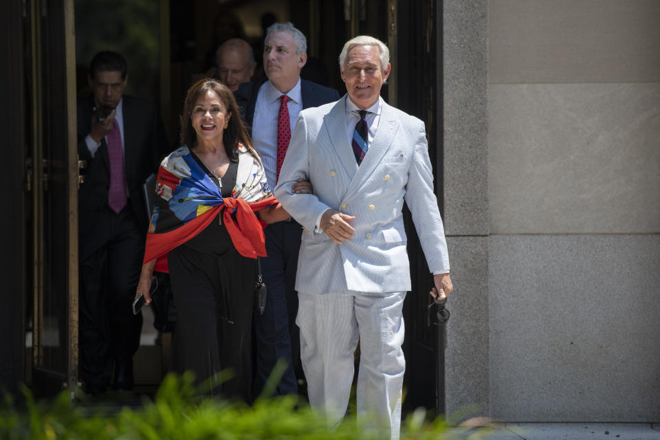 Roger Stone, a longtime confidant of President Donald Trump, accompanied by his wife, Nydia Stone, leaves federal court in Washington, Tuesday, July 16, 2019. (AP Photo/Sait Serkan Gurbuz)