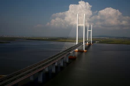 A general view shows the unfinished New Yalu River bridge that was designed to connect China's Dandong New Zone, Liaoning province, and North Korea's Sinuiju, September 11, 2016. REUTERS/Thomas Peter/File Photo