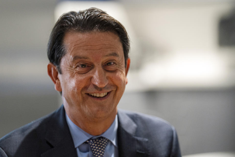 José Muñoz, President and Global COO of Hyundai Motor Company and President and CEO, Hyundai and Genesis Motor North America speaks to the press after a signing ceremony at Georgia Tech in Atlanta, Tuesday, Sept. 19, 2023. (Matthew Pearson/WABE via AP)