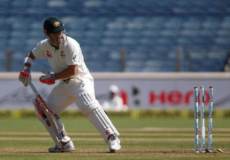 Cricket - India v Australia - First Test cricket match - Maharashtra Cricket Association Stadium, Pune, India - 23/02/17. Australia's David Warner is bowled out by India's Umesh Yadav. REUTERS/Danish Siddiqui