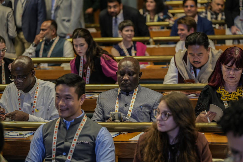 Delegates from the Group of 20 nations attend a tourism meeting in Srinagar, Indian controlled Kashmir, Monday, May 22, 2023. The meeting condemned by China and Pakistan is the first significant international event in Kashmir since New Delhi stripped the Muslim-majority region of semi-autonomy in 2019. (AP Photo/Mukhtar Khan)