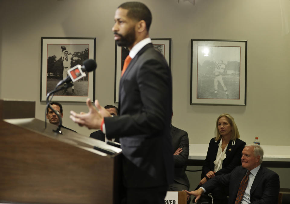 Cleveland Browns owner Jimmy and Dee Haslam, right, listen as general manager Andrew Berry, left, speaks during a news conference at the NFL football team's training facility, Wednesday, Feb. 5, 2020, in Berea, Ohio. Berry returned to the team after a one-year stint in the Philadelphia Eagles' front office. Berry was the Browns' vice president of player personnel from 2016-18. (AP Photo/Tony Dejak)