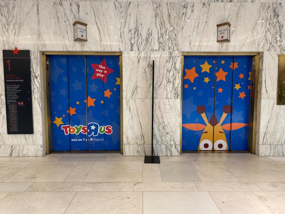 The Toy's 'R' Us elevator doors inside Macy's.
