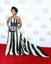 <p>Janelle never runs out of black-and-white options, choosing a dramatic Carolina Herrera gown for this occasion. <i>[Photo: Getty]</i> </p>