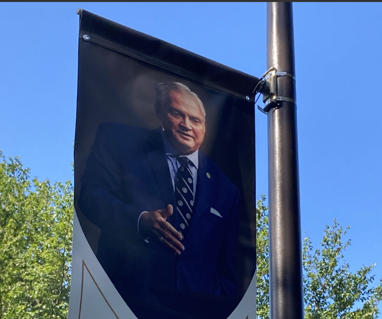 A banner that flies outside at Southern Baptist Theological Seminary bearing a photo of its presdent. R. Albert Mohler, is bigger than a plaque hanging inside a chapel nearby intended to atone for the seminary's historic role defending slavery and racism.