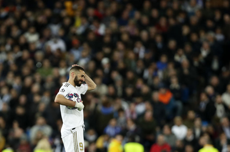 Real Madrid's Karim Benzema reacts during the Champions League, round of 16, first leg soccer match between Real Madrid and Manchester City at the Santiago Bernabeu stadium in Madrid, Spain, Wednesday, Feb. 26, 2020. (AP Photo/Manu Fernandez)