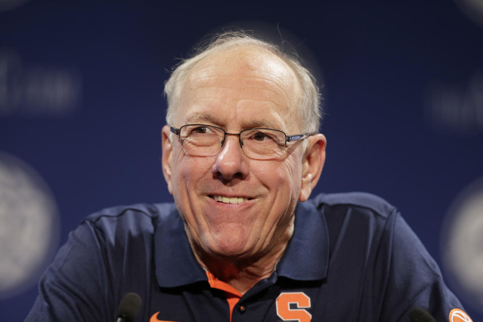 FILE - Syracuse NCAA college basketball head coach Jim Boeheim answers a question during the Atlantic Coast Conference men's media day in Charlotte, N.C., Wednesday, Oct. 28, 2015. Retirement is going just fine, thank you, for Jim Boeheim, who stepped down in March after 47 years of coaching the Orange. The Hall of Famer, who amassed 1,116 wins, five Final Four trips and the 2003 national championship along the way, says he doesn’t miss the job one bit. (AP Photo/Chuck Burton, File)