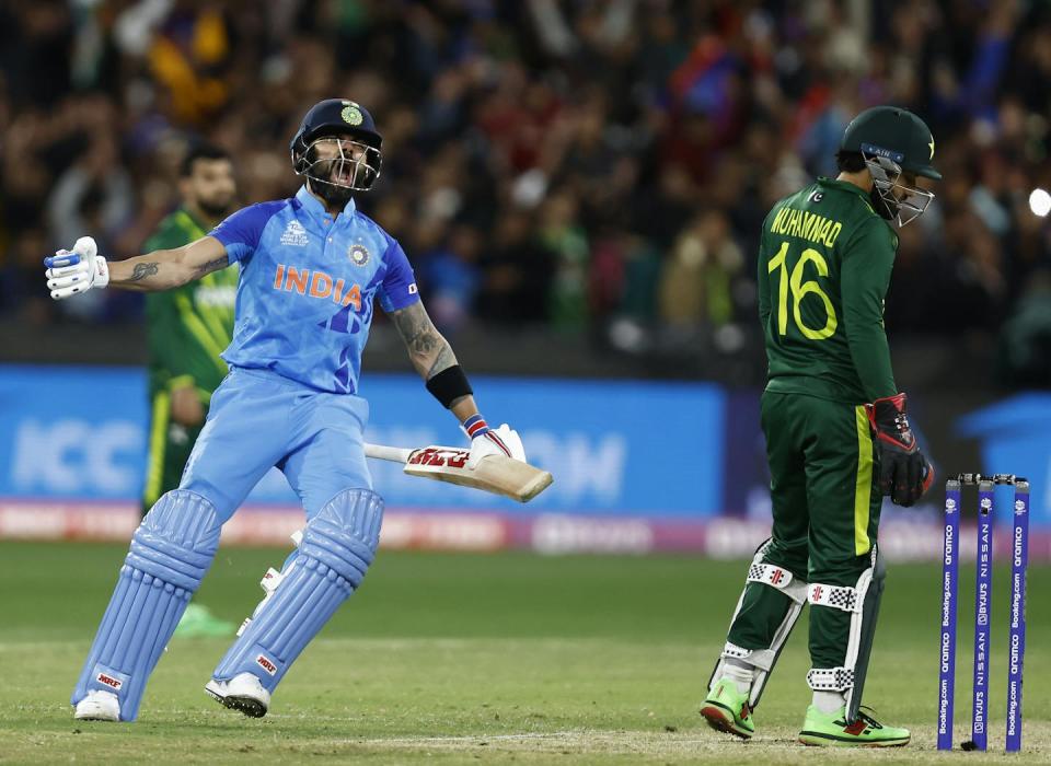 Virat Kohli of India celebrates after the final run is scored during the ICC Men's T20 World Cup match between India and Pakistan in October 2022. <a href="https://www.gettyimages.com/detail/news-photo/virat-kohli-of-india-celebrates-after-the-final-run-is-news-photo/1435855948?adppopup=true" rel="nofollow noopener" target="_blank" data-ylk="slk:Darrian Traynor/ICC via Getty Images;elm:context_link;itc:0;sec:content-canvas" class="link ">Darrian Traynor/ICC via Getty Images</a>