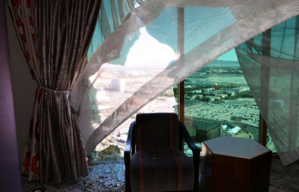 A broken window is seen in Stephen Paddock's room at the Mandalay Bay hotel. (Photo: LVMPD)