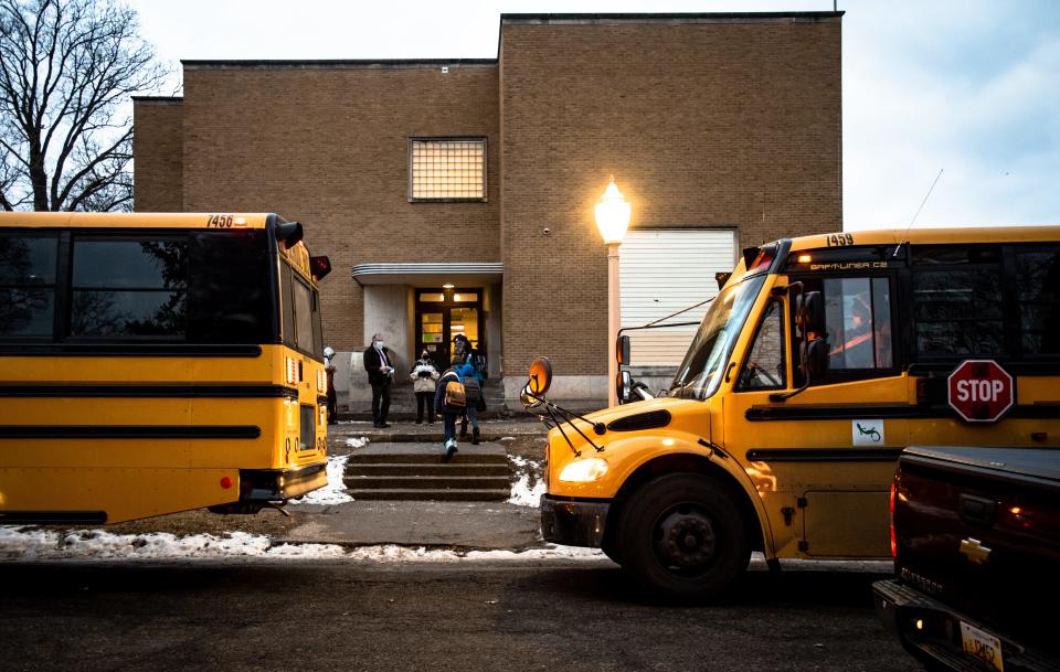 Students enter Mt. Hope STEAM Magnet School early Wednesday morning, Jan. 19, 2022.
