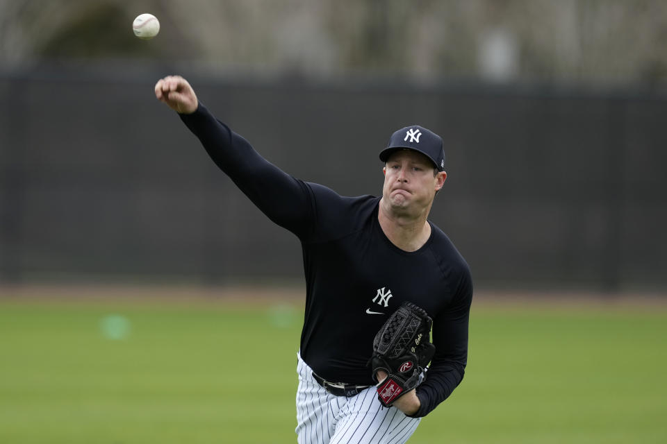 New York Yankees starting pitcher Gerrit Cole throws during a baseball spring training workout Thursday, Feb. 15, 2024, in Tampa, Fla. (AP Photo/Charlie Neibergall)