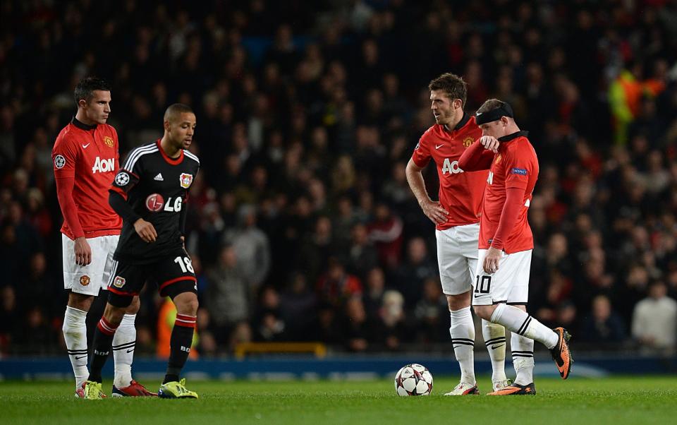 (l-r) Manchester United's Robin van Persie, Michael Carrick and Wayne Rooney react after they concede an equalising goal to make it 1-1