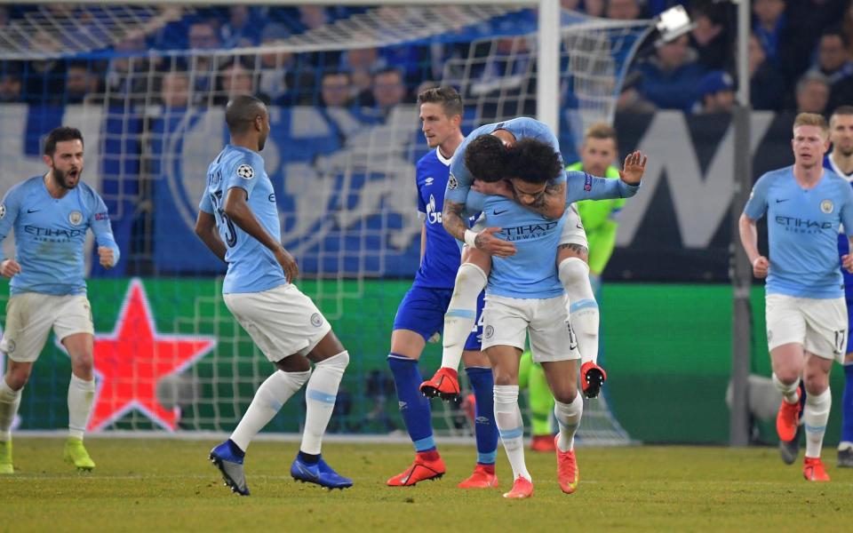 Leroy Sane of Manchester City celebrate with his team mates after he scores the 2nd goal for his team during the UEFA Champions League Round of 16 First Leg match between FC Schalke 04 and Manchester City - Bongarts